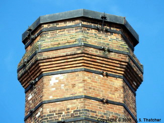 East chimney oversailing