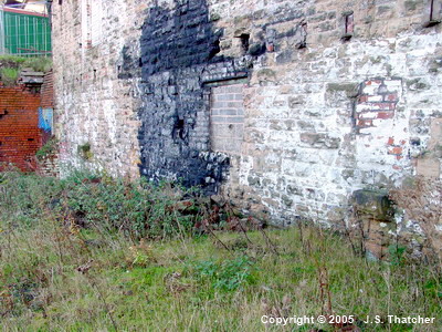 The engine-house wall at the rear of the NW boiler-house.